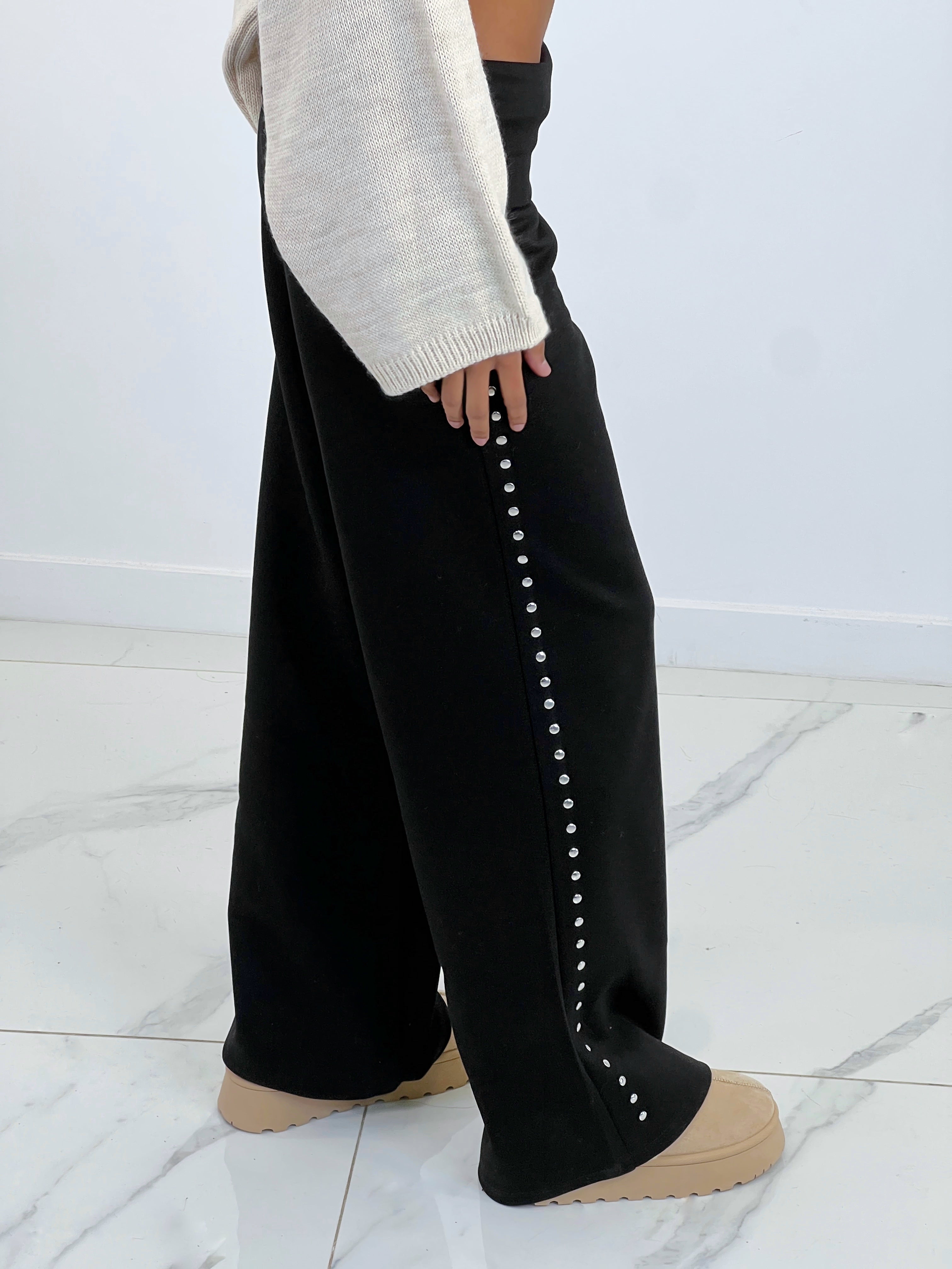 Studded pants with turned waist