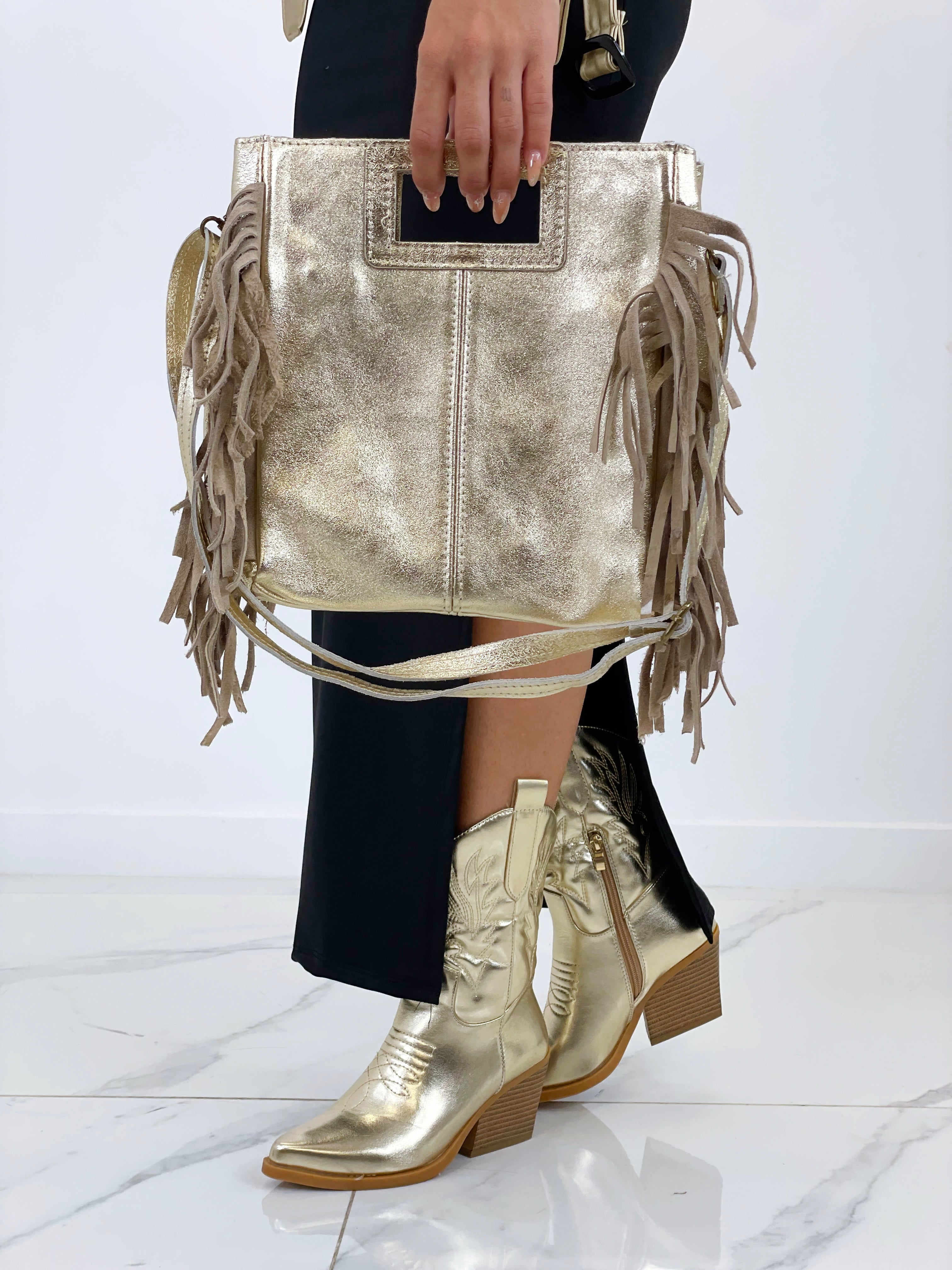 Bolso piel flecos