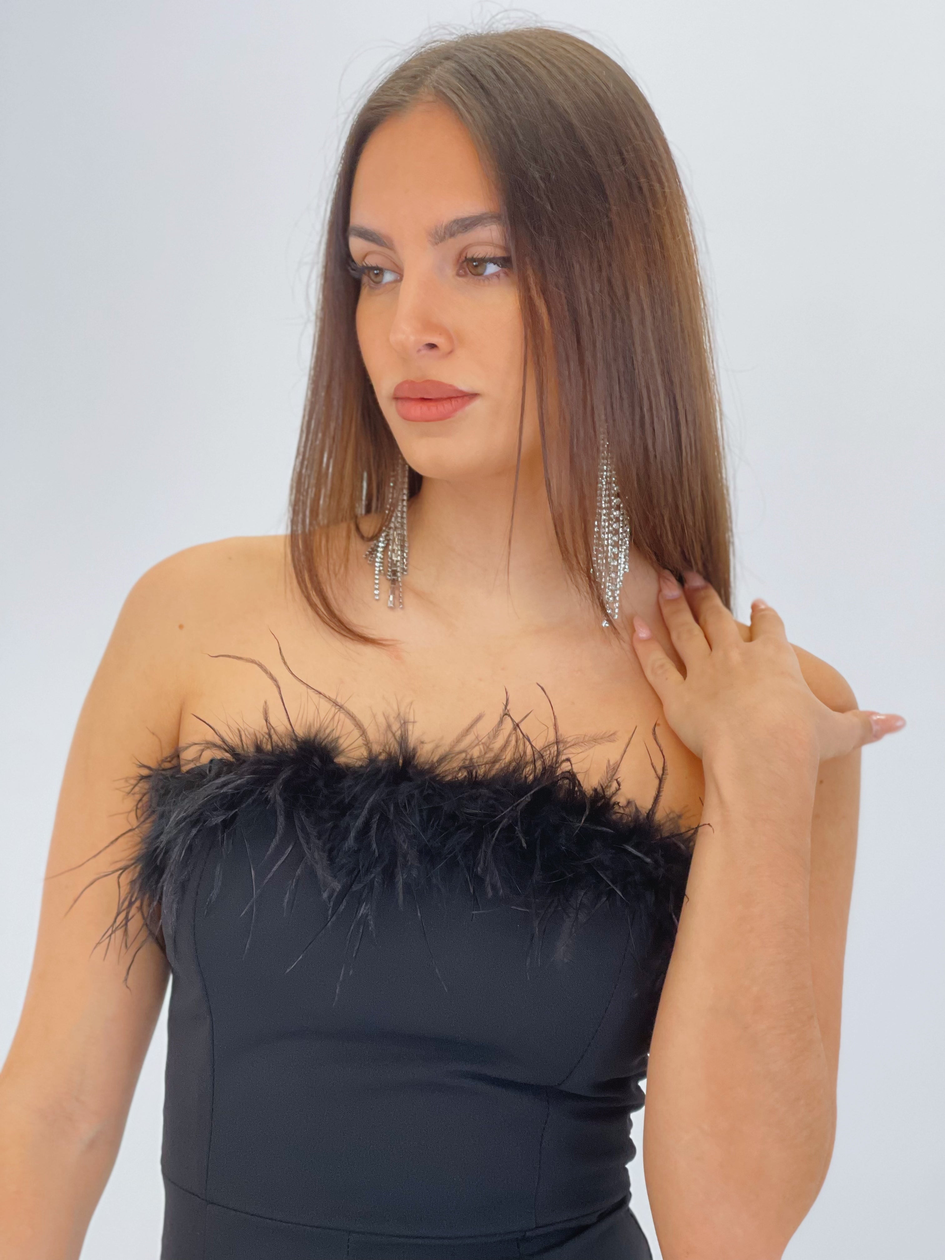 Mono crepscuba plumas