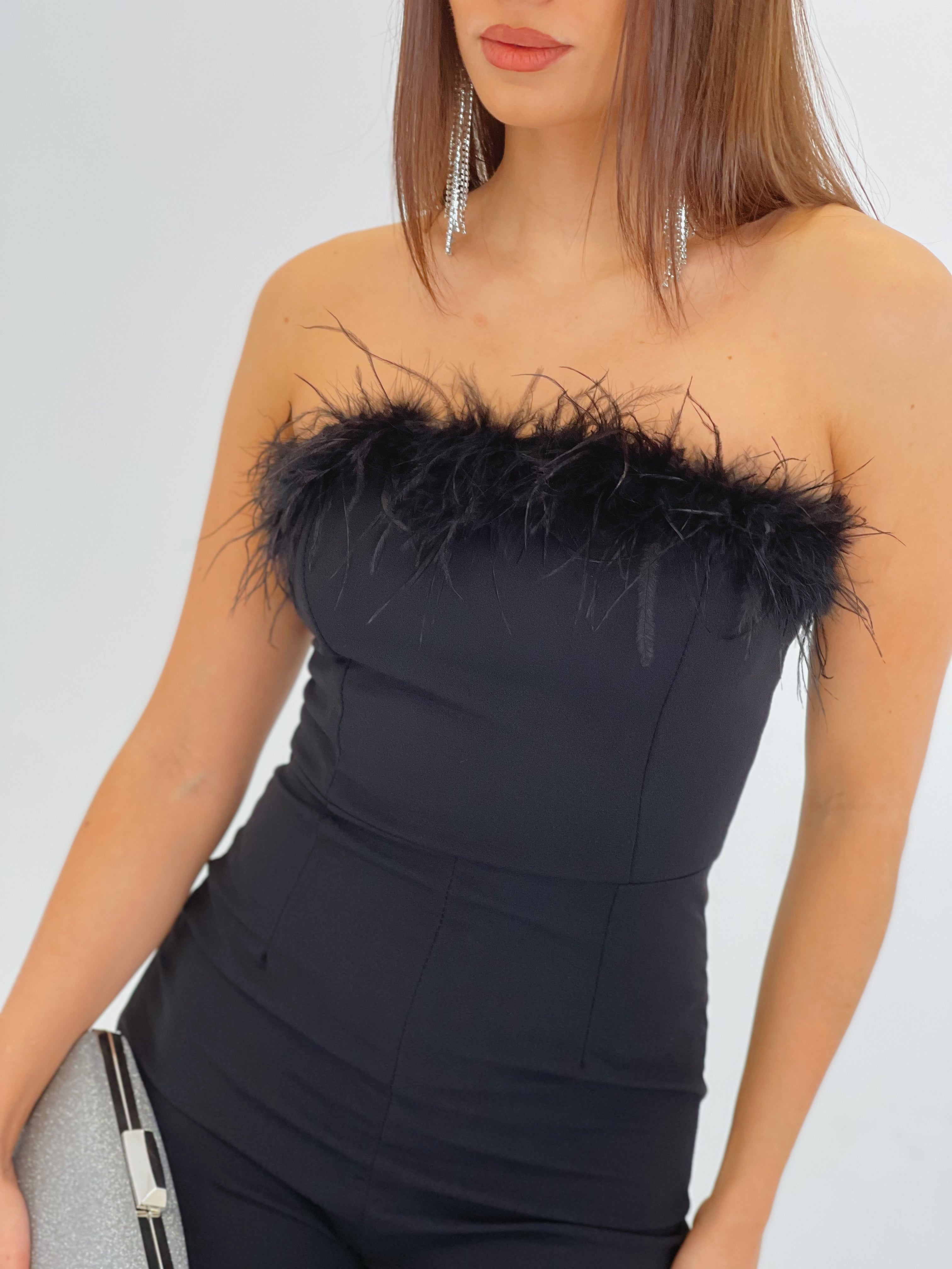 Mono crepscuba plumas